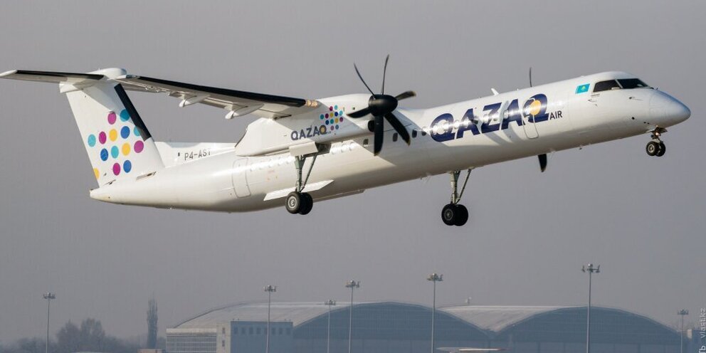 Авиакомпания qazaq. Бомбардье самолет qazaq air. казахская авиакомпания qazaq air. желто голубой самолет казахстанские авиалинии. qazaq air какие самолеты.