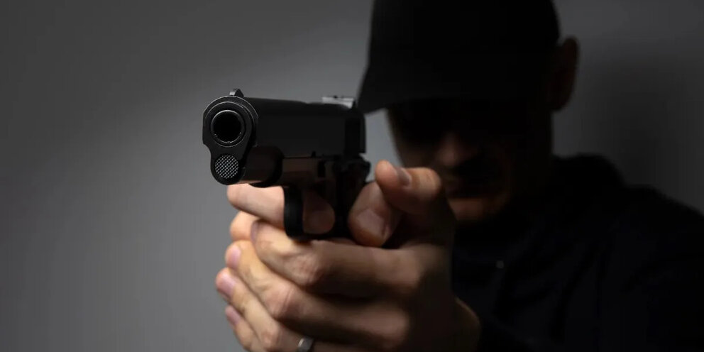 Man with a gun. Man with a gun