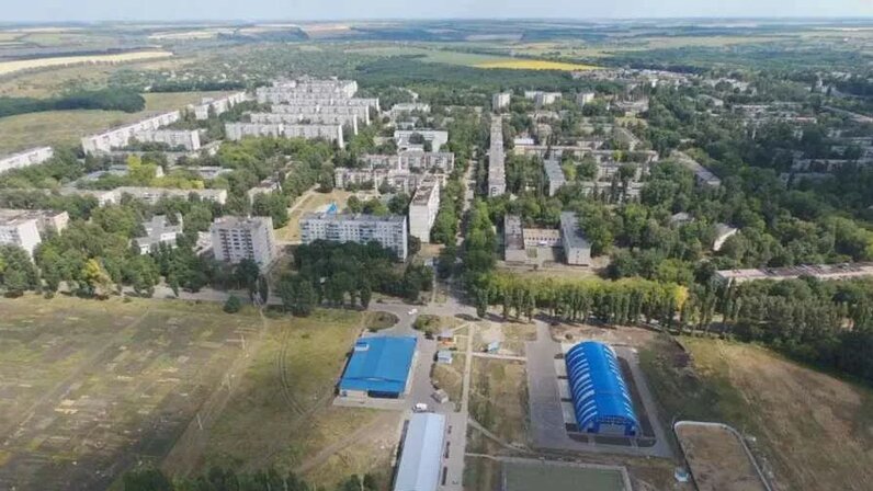 Первомайский город