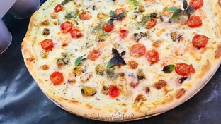 Пицца с морепродуктами 