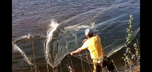 Рыбалка кастинговой сетью.