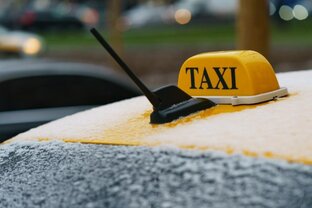 Таксист