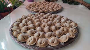 Вареные пельмени и вареники