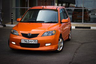 Все поколения Mazda demio