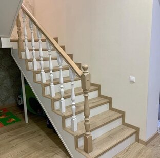 Лестница из ламината quick step