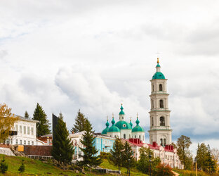 Города