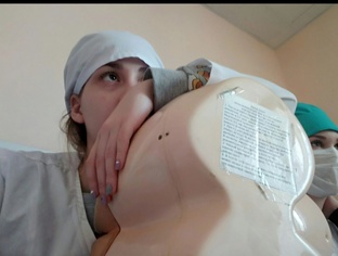 Про акушерку Александру.