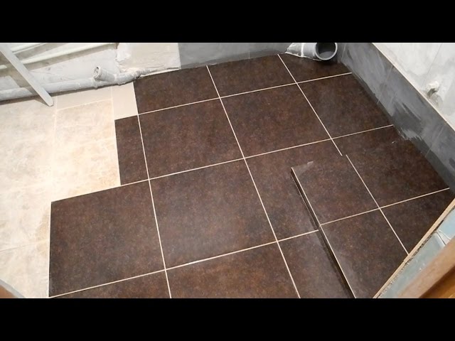 Какую плитку положить на пол в ванной. Какую плитку положить на пол в ванной. Плитка для ванной на пол. Плитка на пол. Плитка напольная в туалет.