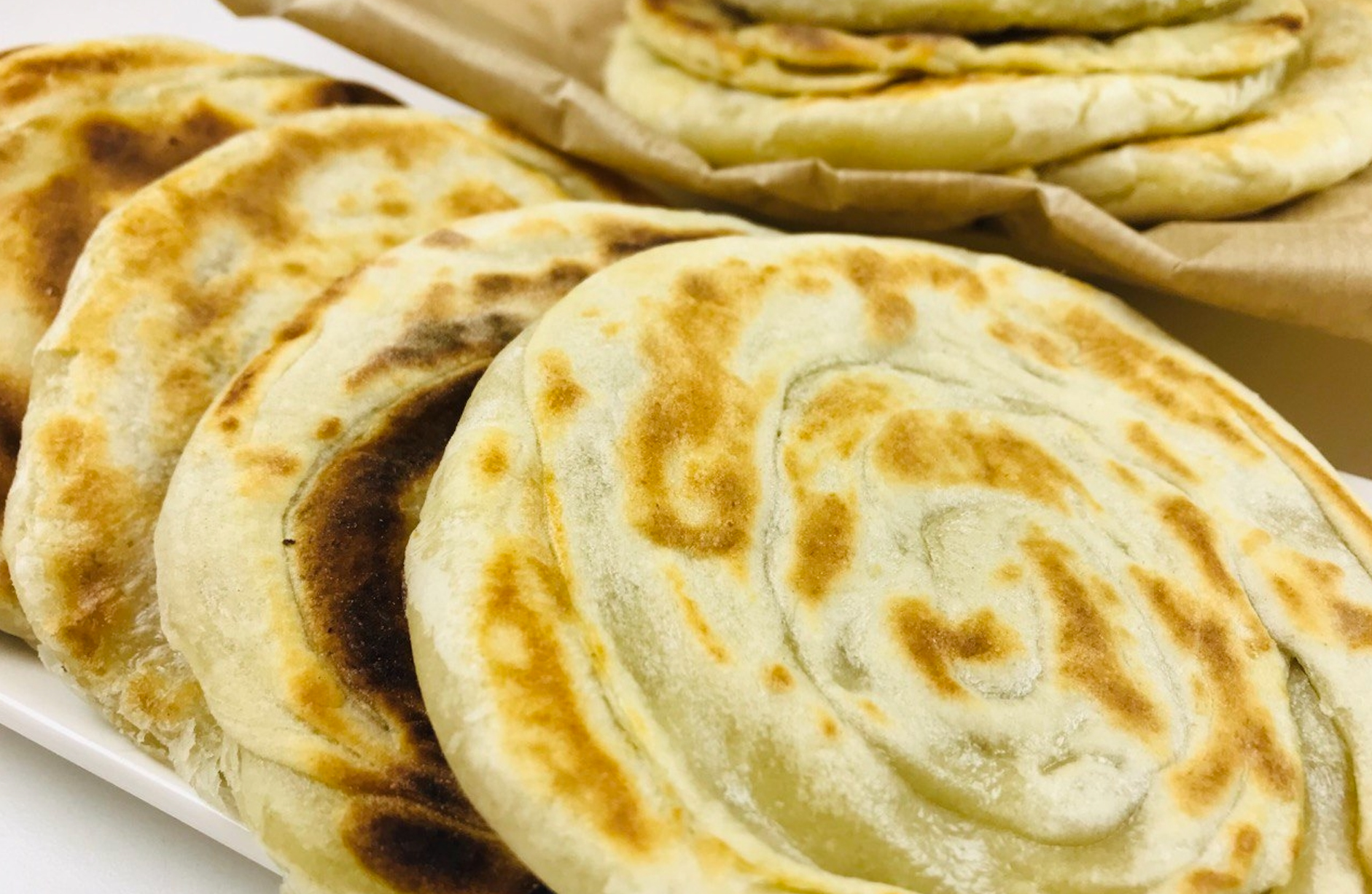 лепешка узбекская. патыр ташкентский. лепешка узбекская. узбекская лепешка на молоке. узбекские лепешки на дрожжах.