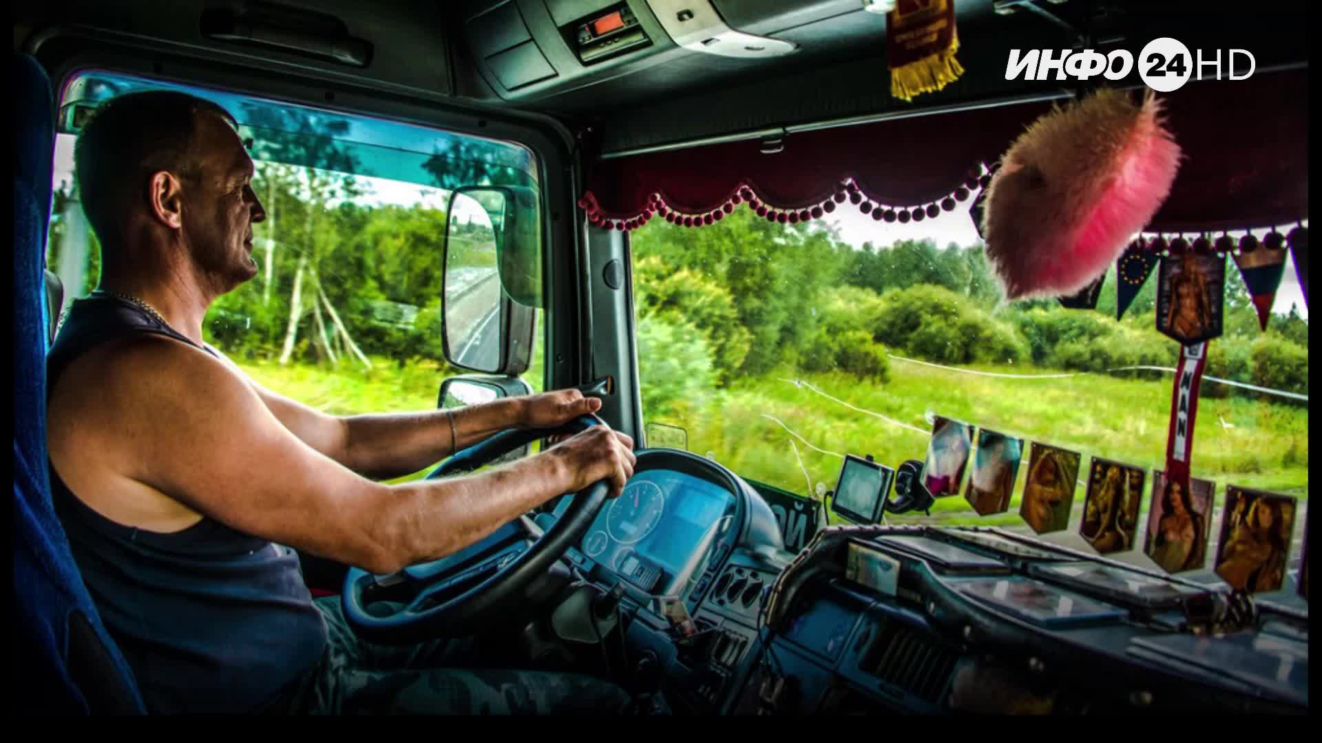 дальнобойщики сериал русский конвой. человек в кабине грузовика. где едут дальнобойщики. трос для грузовиков. сергей астахов оператор.