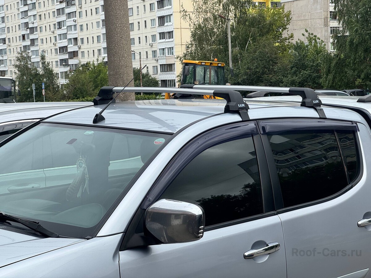 Установка багажника Lux City на Mitsubishi L200 (2006-2015) в Туле