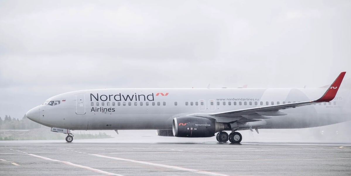 Авиакомпания nordwind отзывы. Nordwind Казань. Нордвинд голубой. Nordwind логотип. Самолет авиакомпании Северный ветер в Омске.