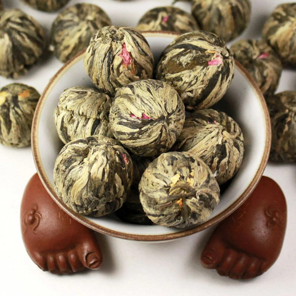 Китайский чай с жасмином. Связанный чай Жасминовая Жемчужина. Китайский чай Жемчужина дракона. Китайский чай в шариках.