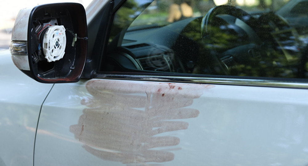 Кровь олимпийца Дениса тена на его автомобиле