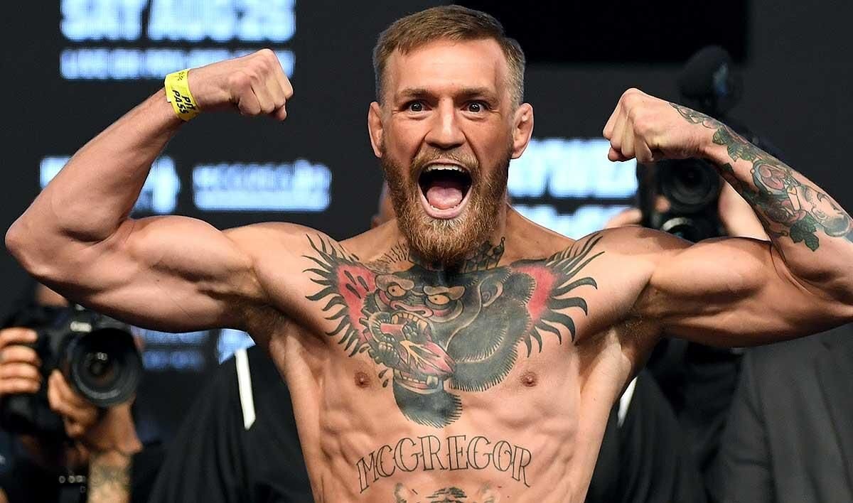 Конор МакГрегор - обладатель поясов в двух весовых категориях