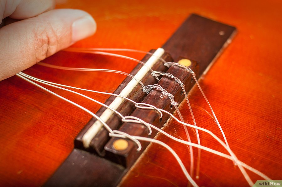 Как закрепить струну на гитаре. Нейлоновые струны dcv100nb. Classic Elite Guitar Strings струны. Нейлоновые струны на классическую гитару Bellucci bc3820. Крепление нейлоновых струн на классической гитаре.