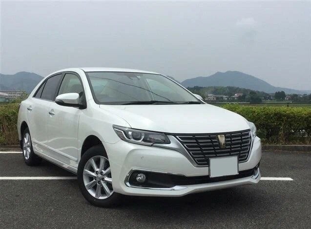 Тойота Премио.