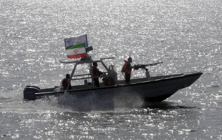    FILE - In this July 2, 2012 file photo, an Iranian Revolutionary Guard speedboat participates in a ceremony remembering the 290 passengers of an Iranian airliner which was downed by a U.S. warship in 1988, in Persian Gulf, Iran. On Monday, April 8, 2019, the Trump administration designated Iran’s Revolutionary Guard a “foreign terrorist organization” in an unprecedented move against a national armed force. Iran’s Revolutionary Guard Corps went from being a domestic security force with origins in the 1979 Islamic Revolution to a transnational fighting force. (AP Photo/Vahid Salemi, File) David Harutunov
