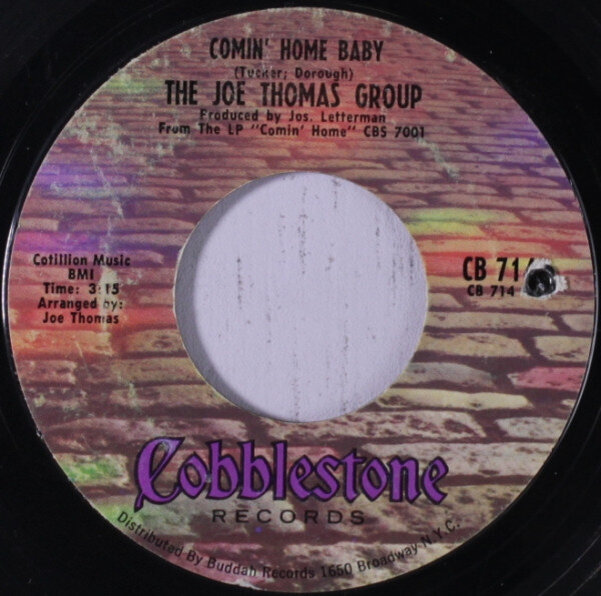 Сингл группы Джо Томаса 'Comin' Home Baby', 1968 год. На этикетке указан LP, на котором можно услышать мелодию