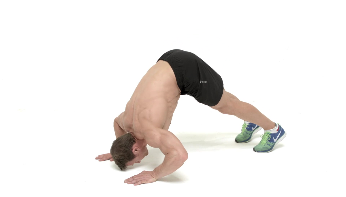 Отжимания. Отжимания уголком. Парень отжимается. Отжимания от пола вниз головой. Отжимания.