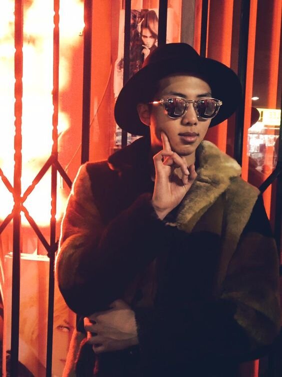 BTS. RM in a fur coat