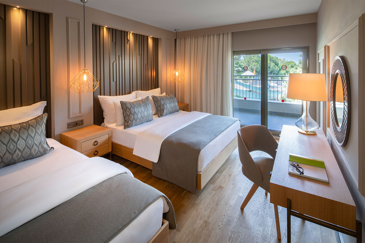 Спальня в one-bedroom residence в Barut Hemera (фото с официального сайта)