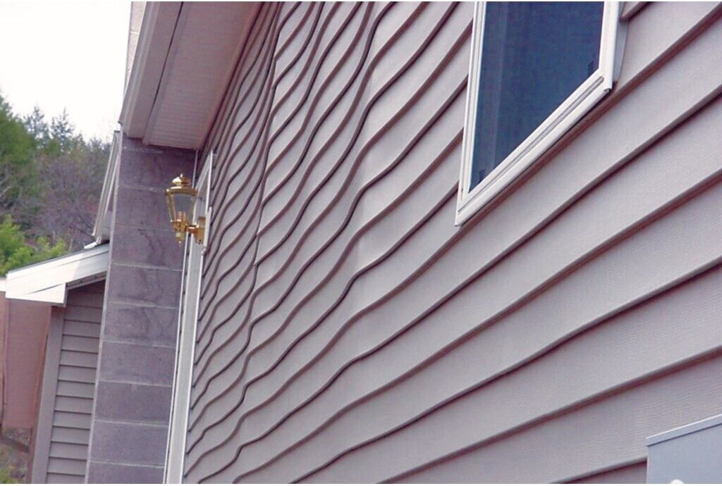 Последствия монтажа винилового сайдинга без учета термического расширения