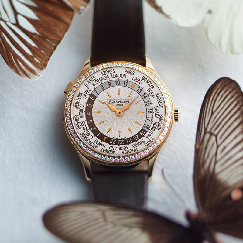 Часы Patek Philippe Complications в 36 мм корпусе из розового золота с бриллиантами по безелю с функцией мирового времени и указателем день/ночь
