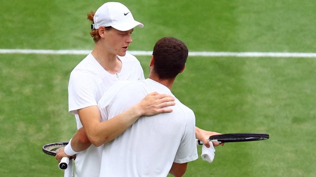    Янник Синнер и Роман Сафиуллин. Reuters