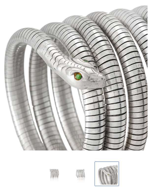 https://www.sothebys.com/en/buy/auction/2023/freddie-mercury-a-world-of-his-own-the-evening-sale/freddie-mercurys-coiled-silver-snake-chain-bangle?locale=en