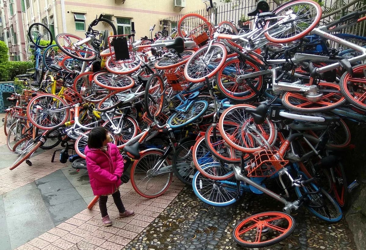 Китайский велосипед. Ofo велосипеды. Велосипед на китайском. Велосипедисты в китае. Китайский велосипед.