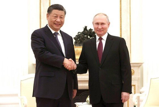    Председатель КНР Си Цзиньпин и президент России Владимир Путин