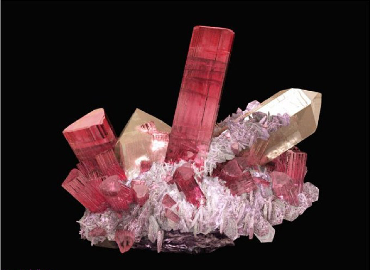 Рубеллит - это название уже огранённого турмалина, поэтому коллекционные образцы с этим минералом принято называть розовым турмалином. К тому же, по образцу даже ювелир не сможет отгадать останется "рубеллитовость" ограненного камня или нет)