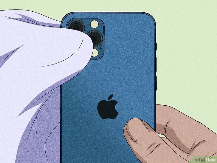 Очистите объектив. Со временем на объективе камеры могут попасть ворсинки, что приведет к размытому изображению. Просто хорошенько протрите его чистой тканью.