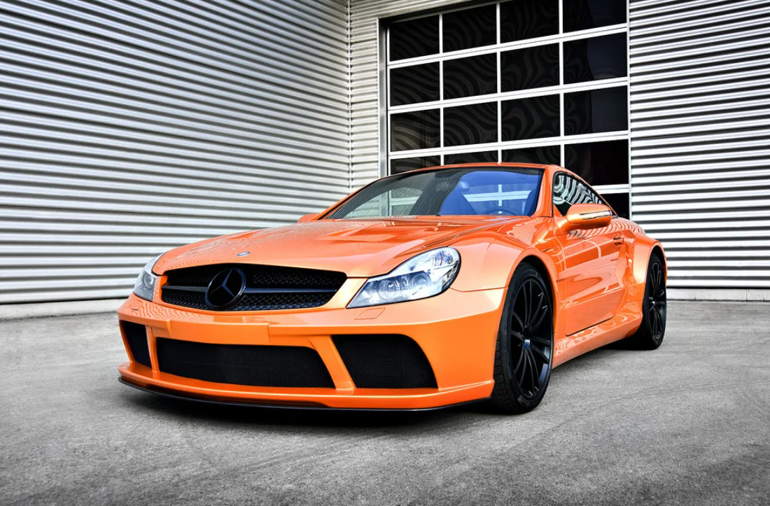 Сайт про автомобили. Mercedes sl65 AMG оранжевый. SL 63 AMG. Mercedes sl65 AMG Black Series. Mercedes SL оранжевый.