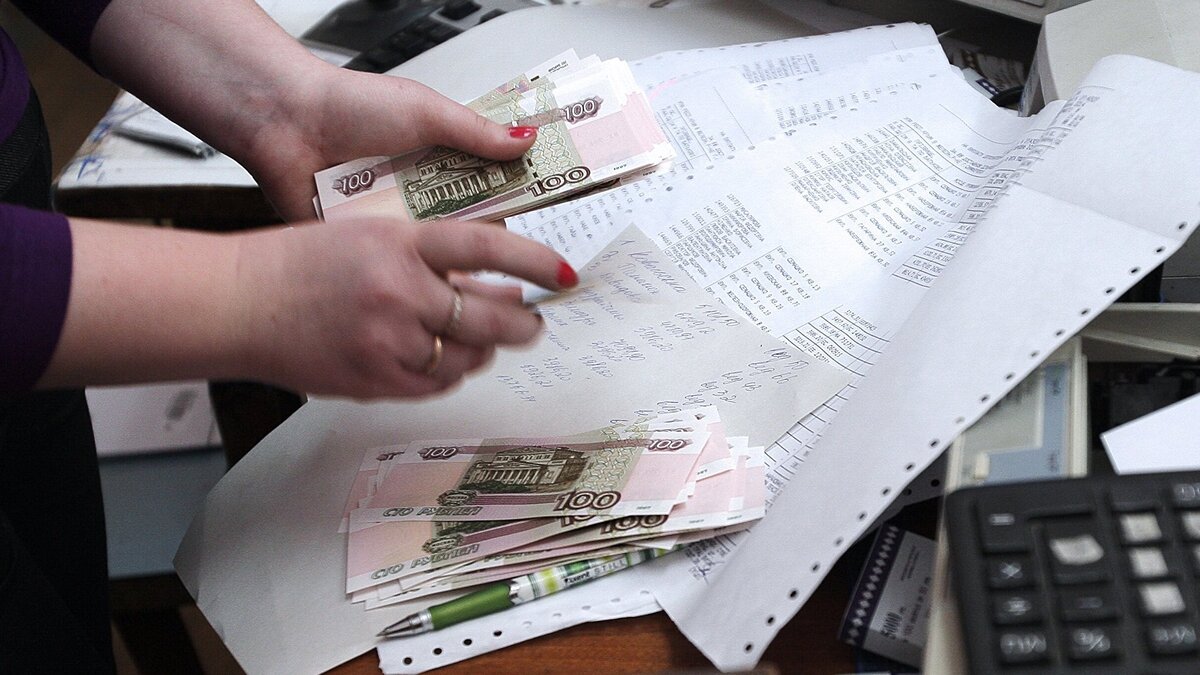    Выдача денег© РИА Новости . Тарас Литвиненко