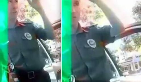  
Сотрудник ДПС на улице Бешарик в Ташкенте. Кадры любительской видеозаписи