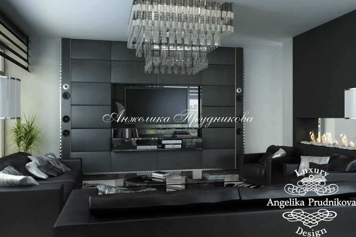 На фото: Высокотехнологичная ТВ-зона с черными декоративными панелями