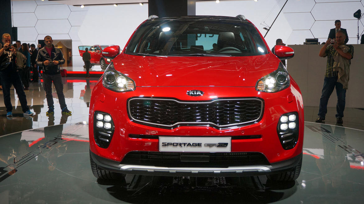 Kia Sportage оранжевая 2012