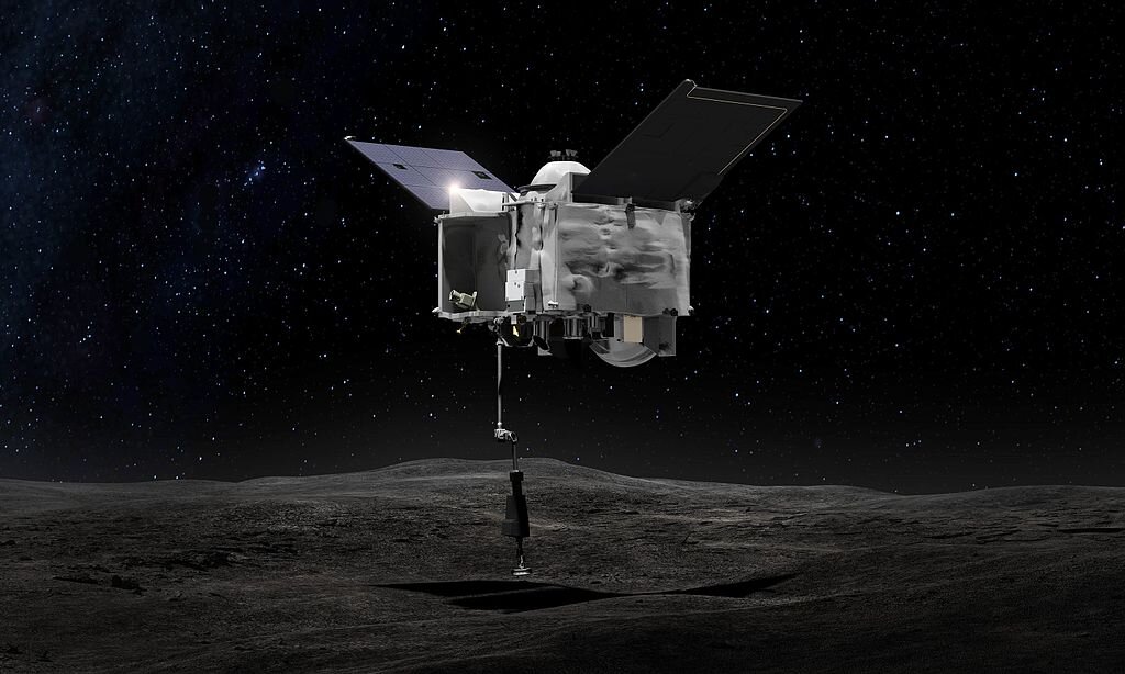Концепция художника: Американская межпланетная станция OSIRIS-REx на астероиде Бенну. Изображение: NASA.