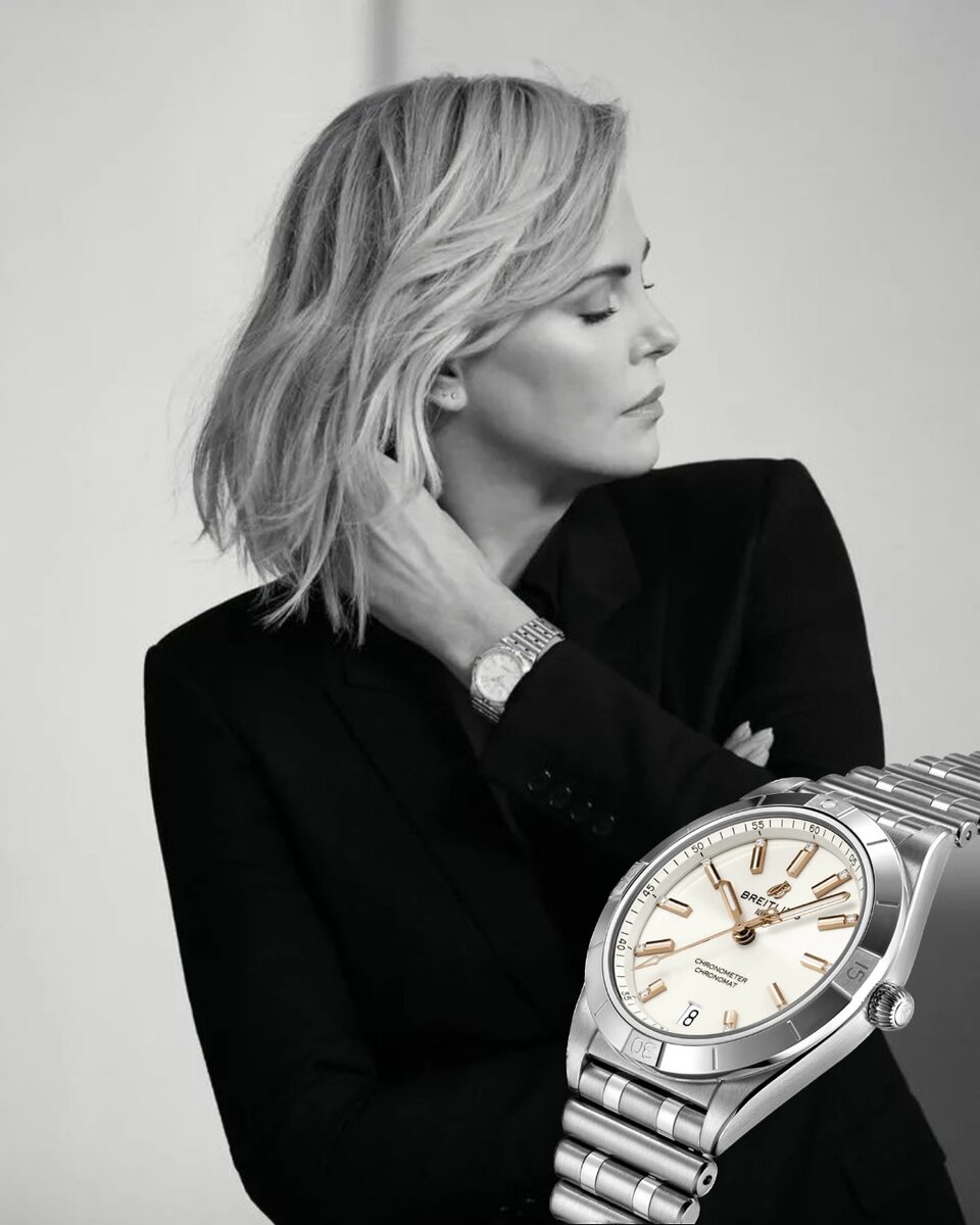 Шарлиз Терон и её часы Breitling Chronomat