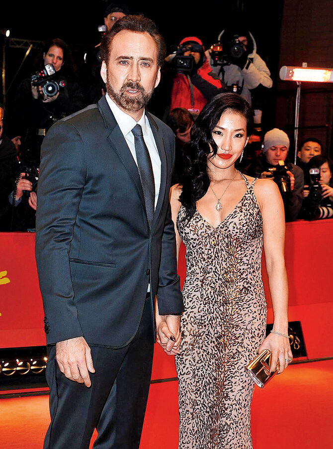 С третьей женой Элиc Ким. Фото: Getty