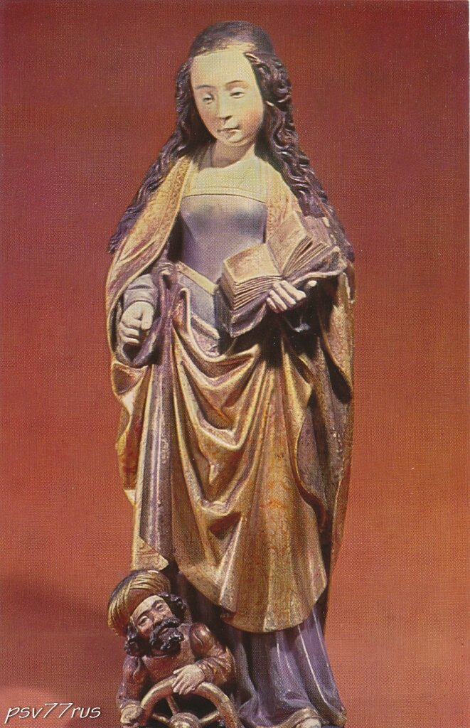 Святая Екатерина. Неизвестный мастер. Начало XVI века.
Нидерланды.
Дерево (орех), раскрашенное и позолоченное. Высота 39 см.
Государственный Эрмитаж. Ленинград.