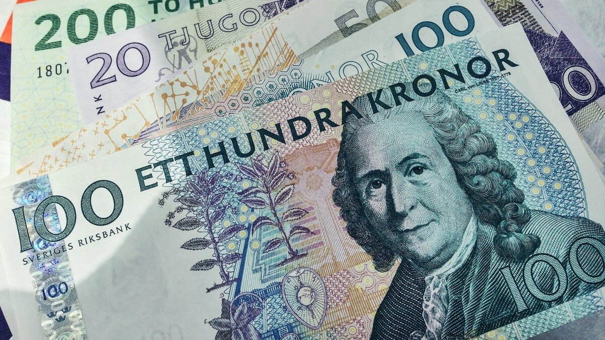 Шведские кроны в доллары. Швед с деньгами. 20 Tjugo kronor в рублях. E-Krona.