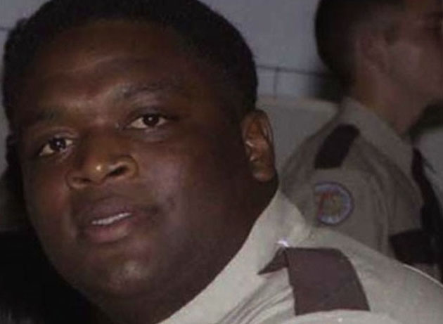 Рик во время работы охранником в тюрьме.