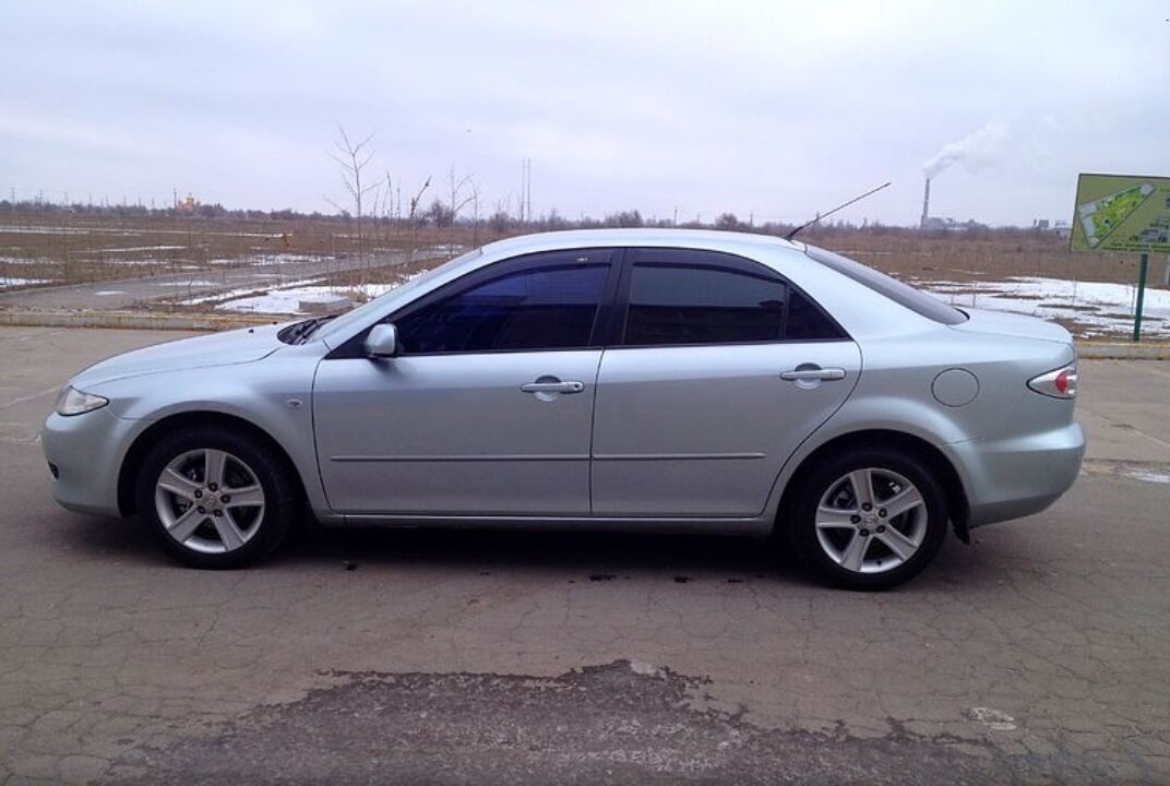                                                                       (Примерное фото той Мазды) 