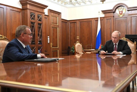    Андрей Костин и Владимир Путин