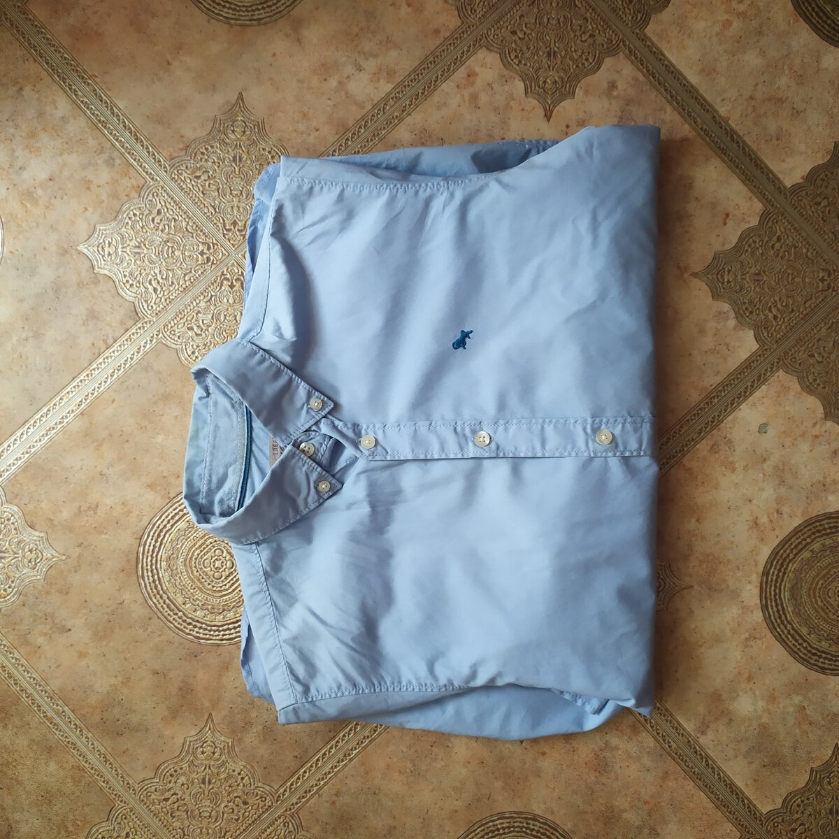 рубашка бренда «H&M