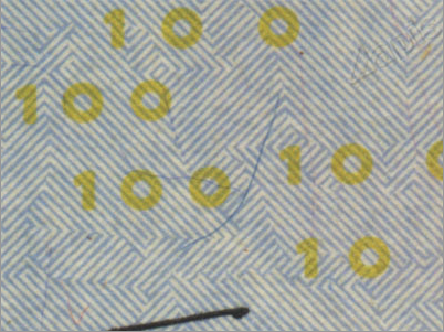 Такие круги, якобы обозначающие номинал, можно увидеть на лицевой стороне 100-долларовой купюры образца 2009 года