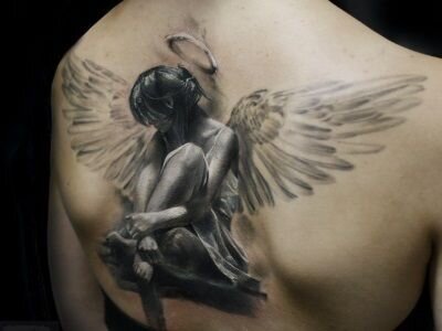 Значение тату Ангел на спине: смысл рисунка, особенности, фото примеры, эскизы и факты